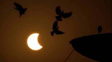 solar eclipse , solar eclipse photos, solar eclipse 2022, partial solar eclipse, indian express