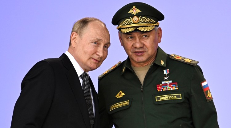 Russia's President Vladimir Putin and Russian Defense Minister Sergei Shoigu attend the opening of the Army 2022 International Military and Technical Forum in the Patriot Park outside Moscow, Russia, on Aug. 15, 2022. (Sputnik, Kremlin Pool Photo via AP, File)