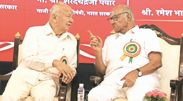NCP chief Sharad Pawar and Congress leader Sushilkumar Shinde during an award ceremony in Pune on Monday. (Express photo by Pavan Khengre)