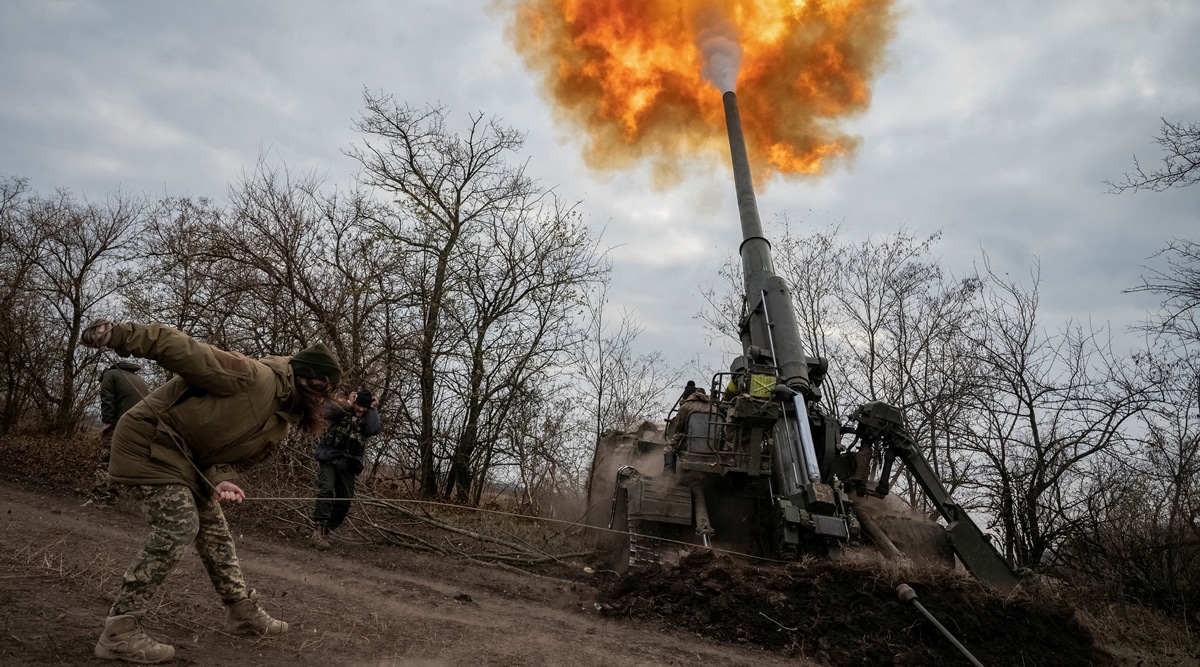 A Ukrainian servicewoman fires a 2S7 Pion self-propelled gun at a position, amid Russia's attack on Ukraine, on a frontline in Kherson region, Ukraine November 9, 2022. (Reuters)