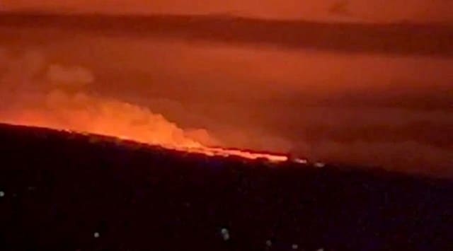 A general view of Hawaii's Mauna Loa volcano, in Kailua-Kona, Hawaii, U.S., November 28, 2022 in this screen grab taken from a social media video. (kelly/ @MAGAHAWAII/via REUTERS)