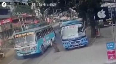 woman's narrow escape from getting hit by bus, narrow escape, escape from accident, accident videos, indian express