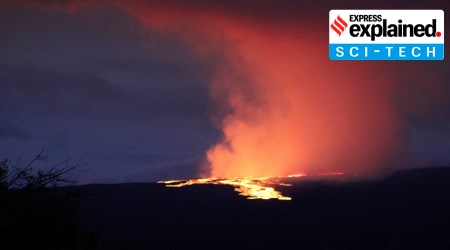 Lava pours out of the summit crater of Mauna Loa.