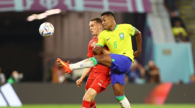 Brazil's Alex Sandro in action with Switzerland's Michel Aebischer. (REUTERS) 
