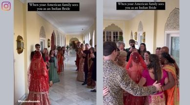 American bride in Indian wedding attire, American bride in wedding lehenga, wholesome wedding video, cross culture wedding wholesome viral, white American bride in indian wedding outfit, bride costume reveal reaction viral indian express
