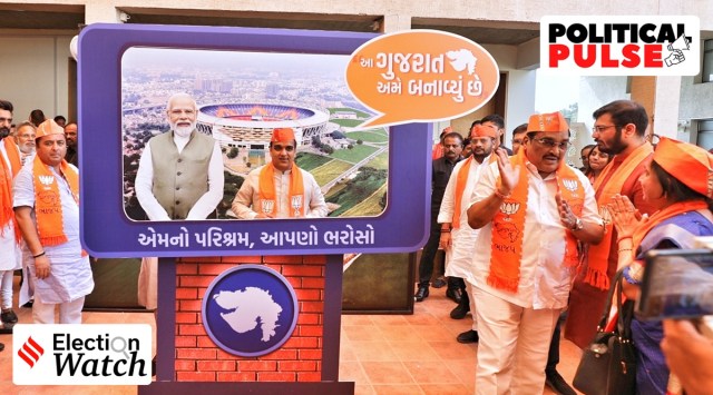 BJP state president C R Paatil (right) and minister Harsh Sanghavi (with the Modi cutout) at the launch of the party’s campaign slogan, song in Gandhinagar on Monday. (Express photo by Nirmal Harindran)