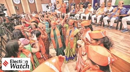 BJP workers at the launch of campaign song and slogan on Monday. (Express photo by Nirmal Harindran)