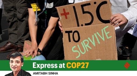Demonstrators pretend to resuscitate the Earth while advocating for the 1.5 degree warming goal to survive at the COP27 UN Climate Summit, Nov. 16, 2022, in Sharm el-Sheikh, Egypt. (AP)
