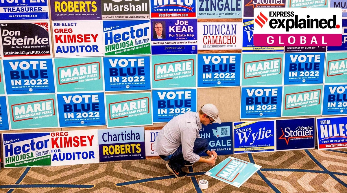 Tim Gowen, field director for Democrat Marie Gluesenkamp Perez's campaign, readies a wall political signage at a viewing party at a hotel in Vancouver, November 8, 2022. (Daniel Kim/The Seattle Times via AP)