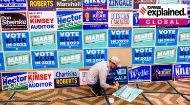 Tim Gowen, field director for Democrat Marie Gluesenkamp Perez's campaign, readies a wall political signage at a viewing party at a hotel in Vancouver, November 8, 2022. (Daniel Kim/The Seattle Times via AP)