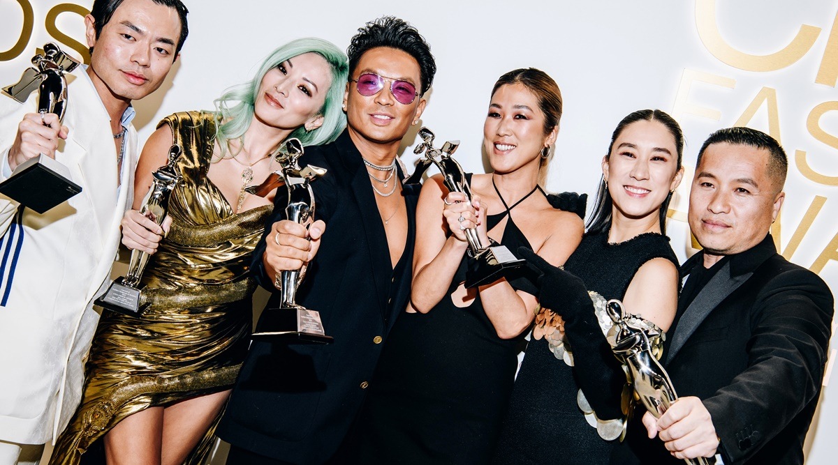 The Slaysians, from left: Ezra William, Tina Leung, Prabal Gurung, Laura Kim and Phillip Lim, with the presenter Eva Chen, second from right, at the 67th annual Council of Fashion Designers of America Awards in New York. (Nina Westervelt/The New York Times)