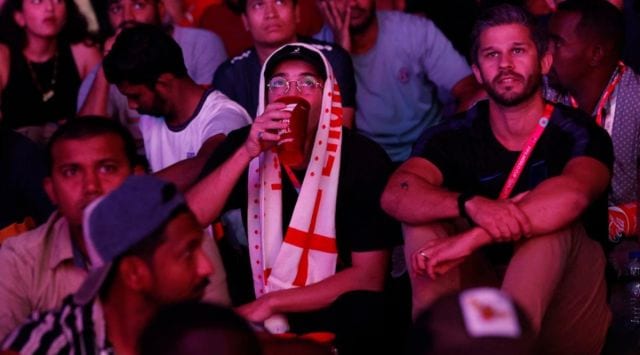 Fans drinks a Budweiser beer during the match between England and United States . (REUTERS) 