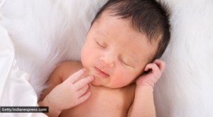 baby, newborn baby, newborn baby care, massaging a newborn baby, how to massage a baby, baby massage tips, right time to massage baby, indian express news