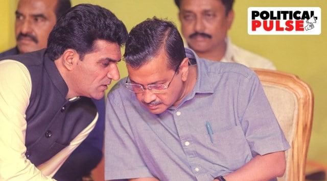 Isudan Gadhvi with AAP party president Arvind Kejriwal in Ahmedabad ahead of the Gujarat Assembly elections. (Express Photo: Nirmal Harindran)