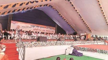 Members of Anjana Chaudhary community gather at Charada village in Gandhinagar Tuesday in support of Vipul Chaudhary, jailed former chairman of Dudhsagar Dairy. Express