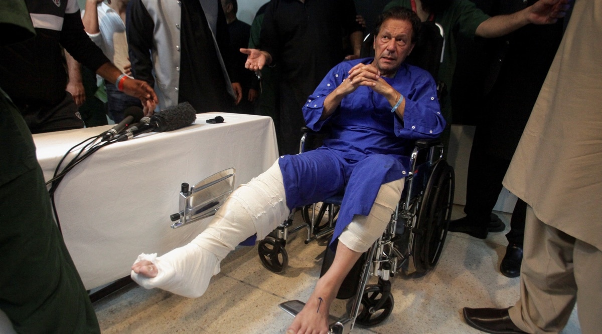 Former Pakistan's Prime Minister Imran Khan sits in a wheelchair after he was wounded following a shooting incident during a long march in Wazirabad, at the Shaukat Khanum Memorial Cancer Hospital & Research Centre in Lahore, Pakistan November 4, 2022. (REUTERS)