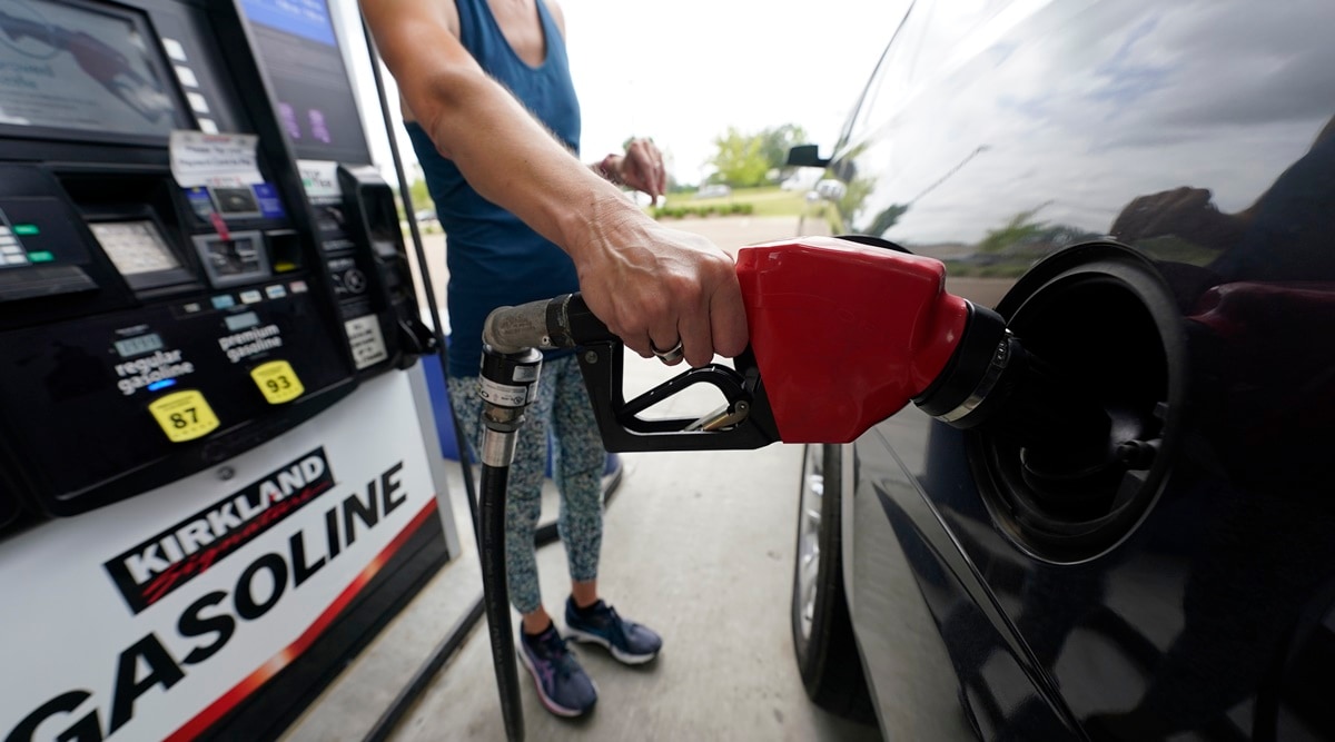 A customer readies to pump gas at this Ridgeland, Miss., Costco, Tuesday, May 24, 2022.  Price increases moderated in the United States last month, Thursday, Nov. 10,  in the latest sign that the inflation pressures that have gripped the nation might be easing as the economy slows and consumers grow more cautious.   (AP Photo/File)