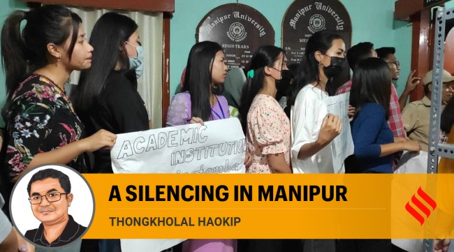 A teacher of Manipuri was served a show cause notice by Manipur University on September 28 for criticising the state government’s “legalisation of liquor”. In pic: Students of Manipur University Friday protested against the showcause notice. (Express Photo)