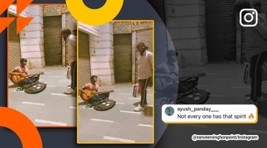 Man's impromptu singing of Mann Bharrya with street musician, Delhi, Connaught Place, Shershaah, B Praak, busker, viral, trending, Indian Express