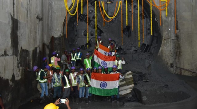MMRC employees celebrating the 100 pc completion of Line 3 tunnelling on 30/11/22, Wednesday (Express photo)