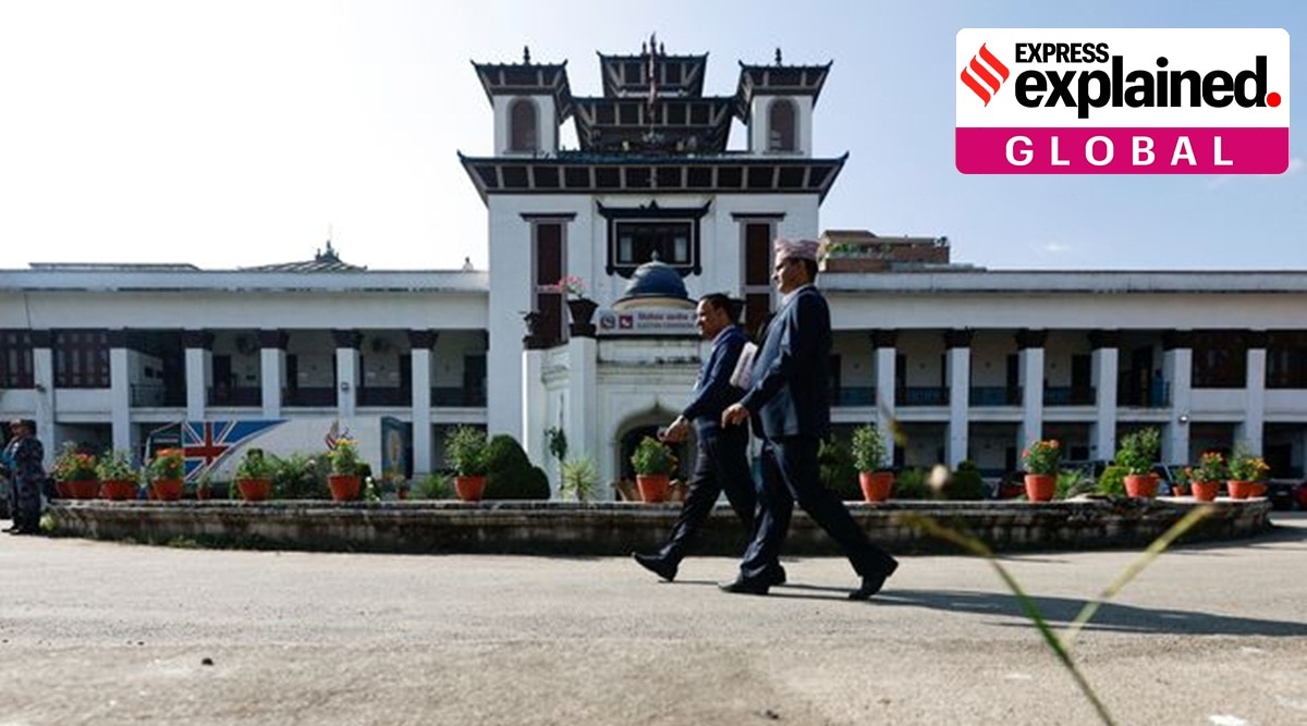 Officials walk at the premises of the Election Commission ahead of the general election scheduled for November, in Kathmandu, Nepal October 31, 2022.