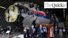 Judges and lawyers view the reconstructed wreckage of Malaysia Airlines Flight MH17, at the Gilze-Rijen military Airbase, southern Netherlands, on May 26, 2021.