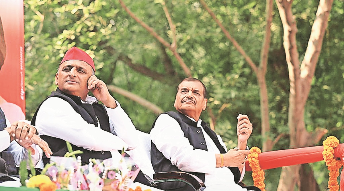 Mainpuri bypoll campaign Akhilesh Yadav touches Shivpals feet as they seek votes for Dimple Lucknow News