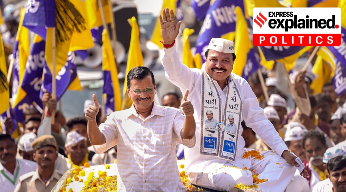Aam Aadmi Party National Coordinator and Delhi Chief Minister Arvind Kejriwal participates in a roadshow for upcoming Gujarat Assembly elections, in Rajkot district, Monday, Nov. 7, 2022.