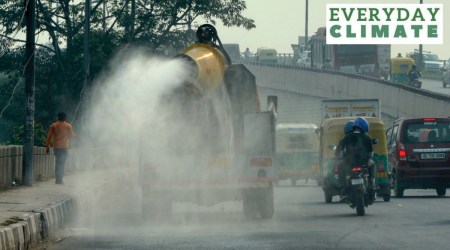 An anti smog gun fitted on a modified truck is used to spray water to curb pollution due to smog, in New Delhi.