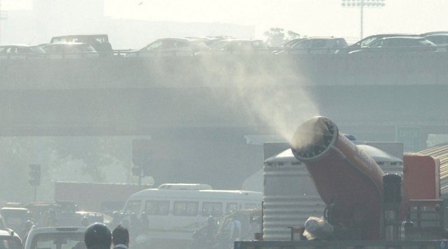 An anti-smog gun being used to spray water droplets to curb air pollution, in Gurugram, November 19, 2022. (PTI)