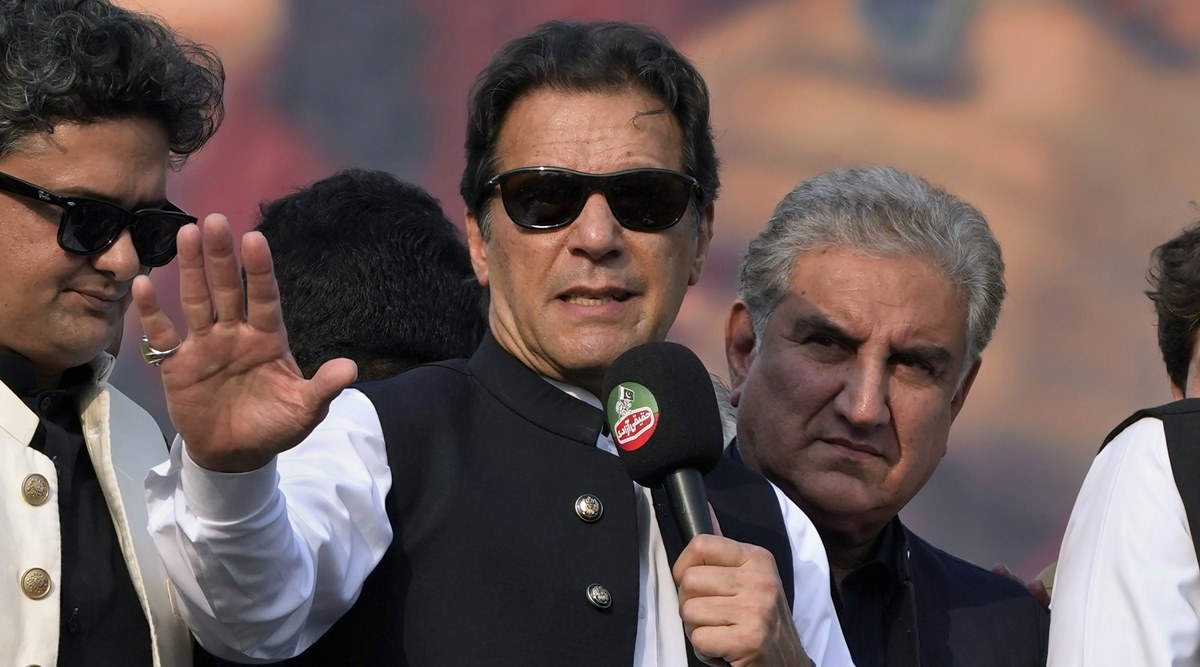 Pakistan's former Prime Minister Imran Khan, center, addresses to his supporters at a rally in Lahore, Pakistan, on October 28 2022. (AP Photo)
