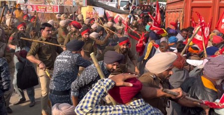 Policemen disburse the protesting members of the "Sanjha Majdoor Morcha" who were marching towards CM Bhagwant Mann's residence in Sangrur on 30/11/22, Wednesday. (Express photo by Gurmeet Singh)