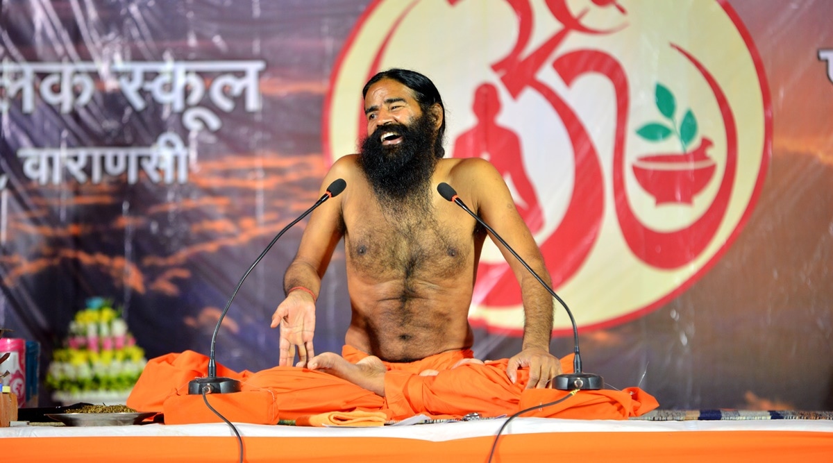 Baba Ramdev teaching yoga at Banaras Public School in Pindra of Varanasi during a yoga camp on 26/4/22. A ban imposed on five products of Ramdev's Divya Pharmacy has been revoked by Uttarakhand authority. (Express/file photo by Anand Singh)