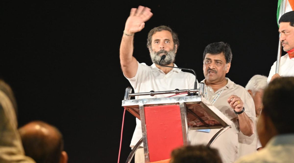 Congress leader Ashok Chavan on the stage with Rahul Gandhi in Degloor, where the Bharat Jodo Yatra entered Maharashtra on Monday night. (Express photo by Alok Deshpande)