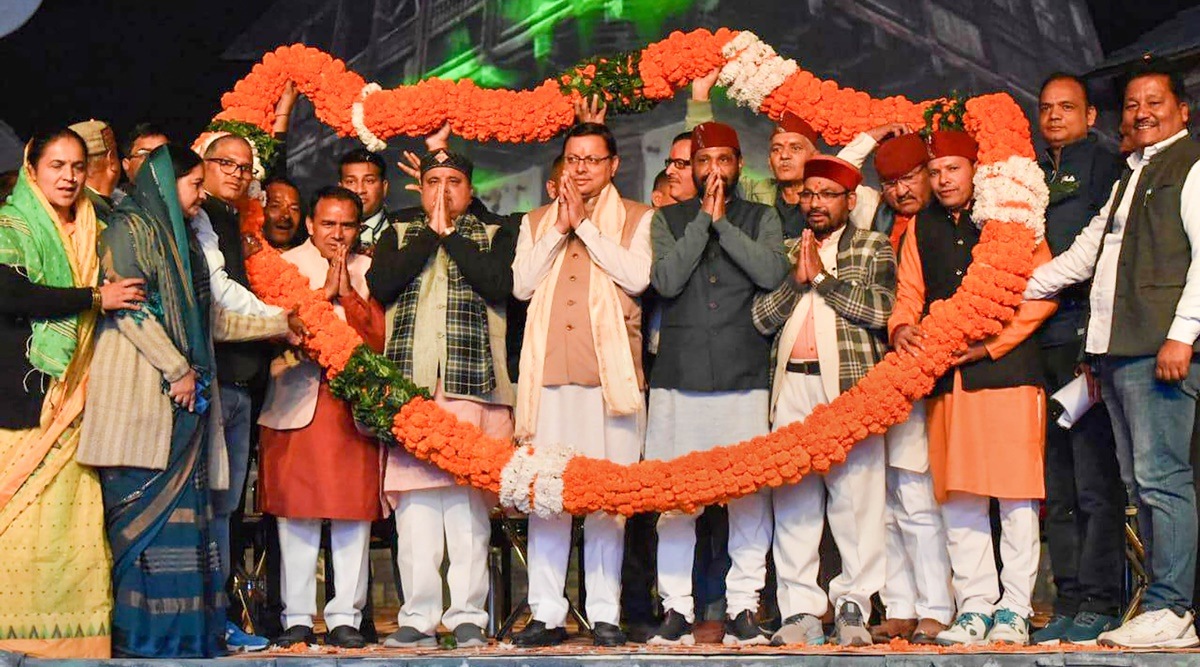 Uttarakhand Chief Minister Pushkar Singh Dhami being garlanded during the inauguration of the 70th State Industrial Development and Cultural Fair, at Gauchar in Chamoli district, Monday, Nov. 14, 2022. His government has given approval for a more stricter anti-conversion law and transfer of High Court to Haldwani. (PTI File/photo)