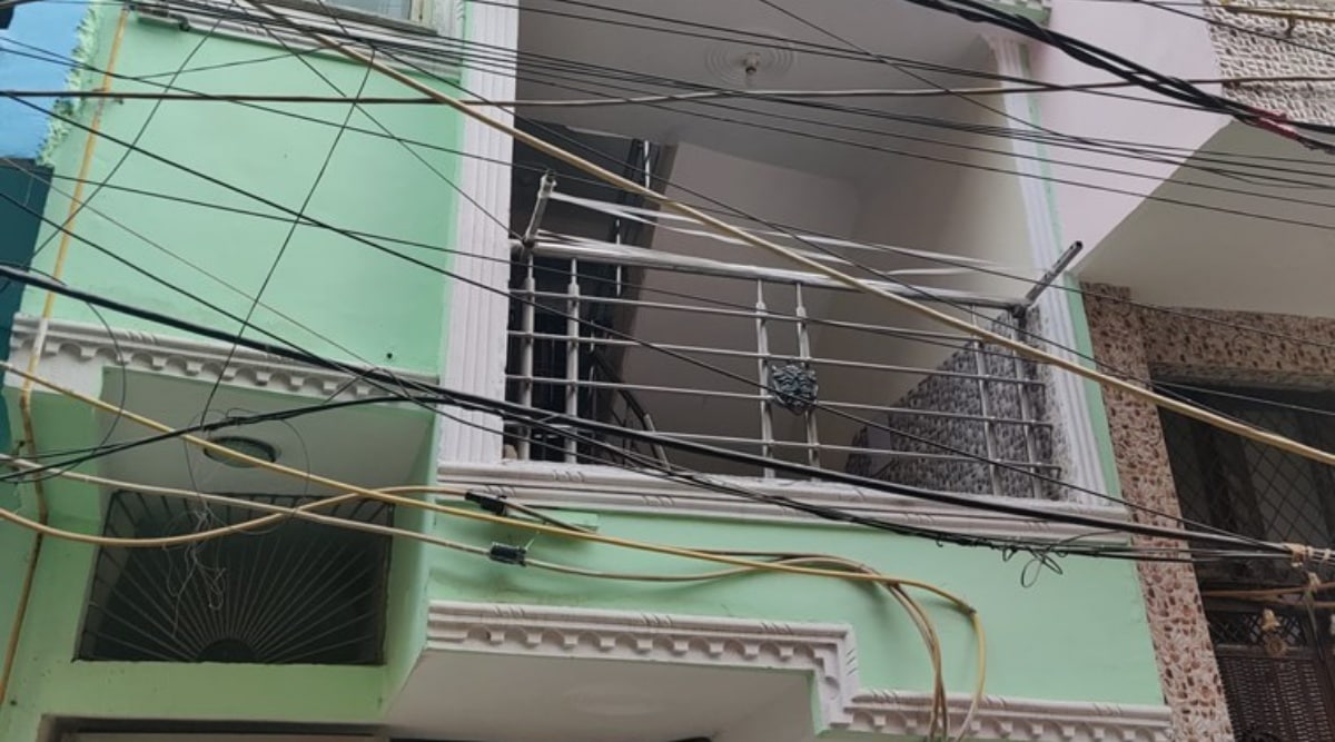 The single-room apartment is located on the first floor in a congested lane in Chhattarpur Pahadi. (Express Photo by Jignasa Sinha)