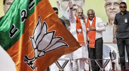 Union Home minister Amit Shah along with CM Bhupendra Patel at Ghatlodiya before the latter left for filing his nomination. (Express photo by Nirmal Harindran)