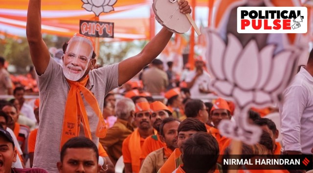 BJP supporters during an election campaign meeting at Kheda, which was attended by Prime Minister Narendra Modi, November 27, 2022. (Express photo by Nirmal Harindran)