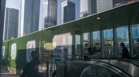 Buildings are reflected in a window in Beijing, China, on Monday, Oct. 24, 2022. (Bloomberg)