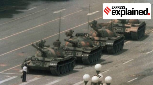 A lone Chinese man standing to block a line of tanks heading east on Beijing's Changan Blvd. near Tiananmen Square.