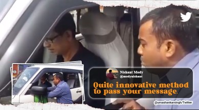 Man barks like dog in protest, man barks like dog in protest after ration card name says kutta, unique protests india, man acts like dog ration card name spelled as kutta, west bengal man barks like dog protest, indian express