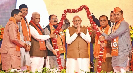 Prime Minister Narendra Modi during an election campaign as part of 'Vijay Sankalp Sammelan' at Race Course Ground in Rajkot on Monday. (Express Photo by Chitral Khambhati)