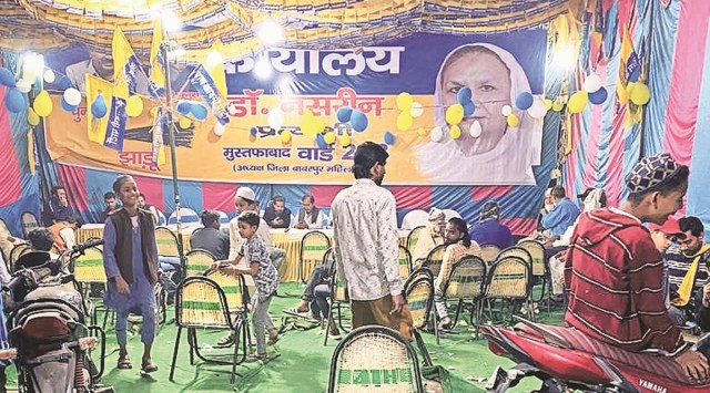 At AAP’s campaign booth in Mustafabad. Express
