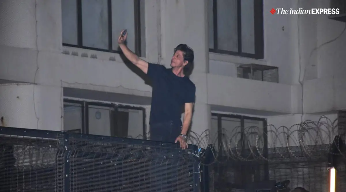 In pics: 'Pathaan' star Shah Rukh Khan shakes hands, blows flying