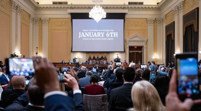 Members of the media record the 9th public hearing held by the House Select Committee investigating the January 6 attack on the U.S. Capitol, on Capitol Hill in Washington on Thursday, Oct. 13, 2022. Former President Donald Trump filed suit Friday, Nov. 11, against the committee, seeking to block the panel’s subpoena that required him to testify and hand over documents related to the effort to overturn the 2020 election. (The New York Times)