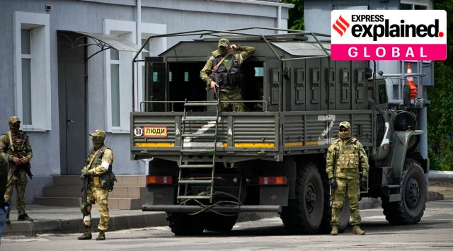 Russian soldiers guard an area as a group of foreign journalists visit in Kherson, Kherson region, south Ukraine, on May 20, 2022.(AP Photo, File)