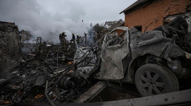 Rescuers work at a site of private houses heavily damaged by a Russian missile strike, amid Russia's attack on Ukraine (Reuters)