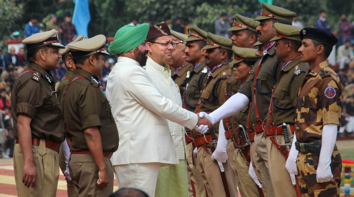 Dehradun: Uttarakhand Governor Lt. General (retd.) Gurmit Singh with Chief Minister Pushkar Singh Dhami being greeted by police personnel during the state's 22nd Foundation Day celebrations, at Reserve Police Line in Dehradun, Wednesday, Nov. 9, 2022. (PTI Photo)