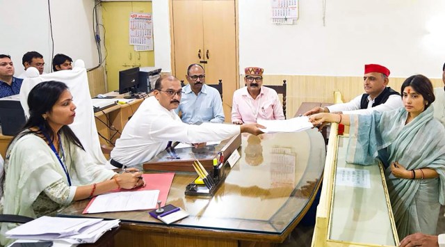  Samajwadi Party (SP) leader Dimple Yadav with her husband and SP President Akhilesh Yadav files nomination for the Mainpuri parliamentary constituency by-elections, in Mainpuri (PTI)