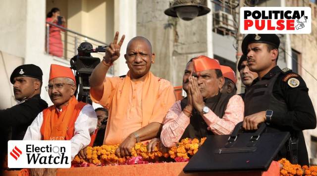 UP CM Yogi Adityanath during a roadshow for Gujarat Assembly election campaign at Godhra on Tuesday. (Express photo by Nirmal Harindran)
